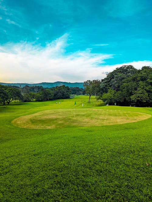 Free Blue Sky and Cloud over Golf Course Stock Photo