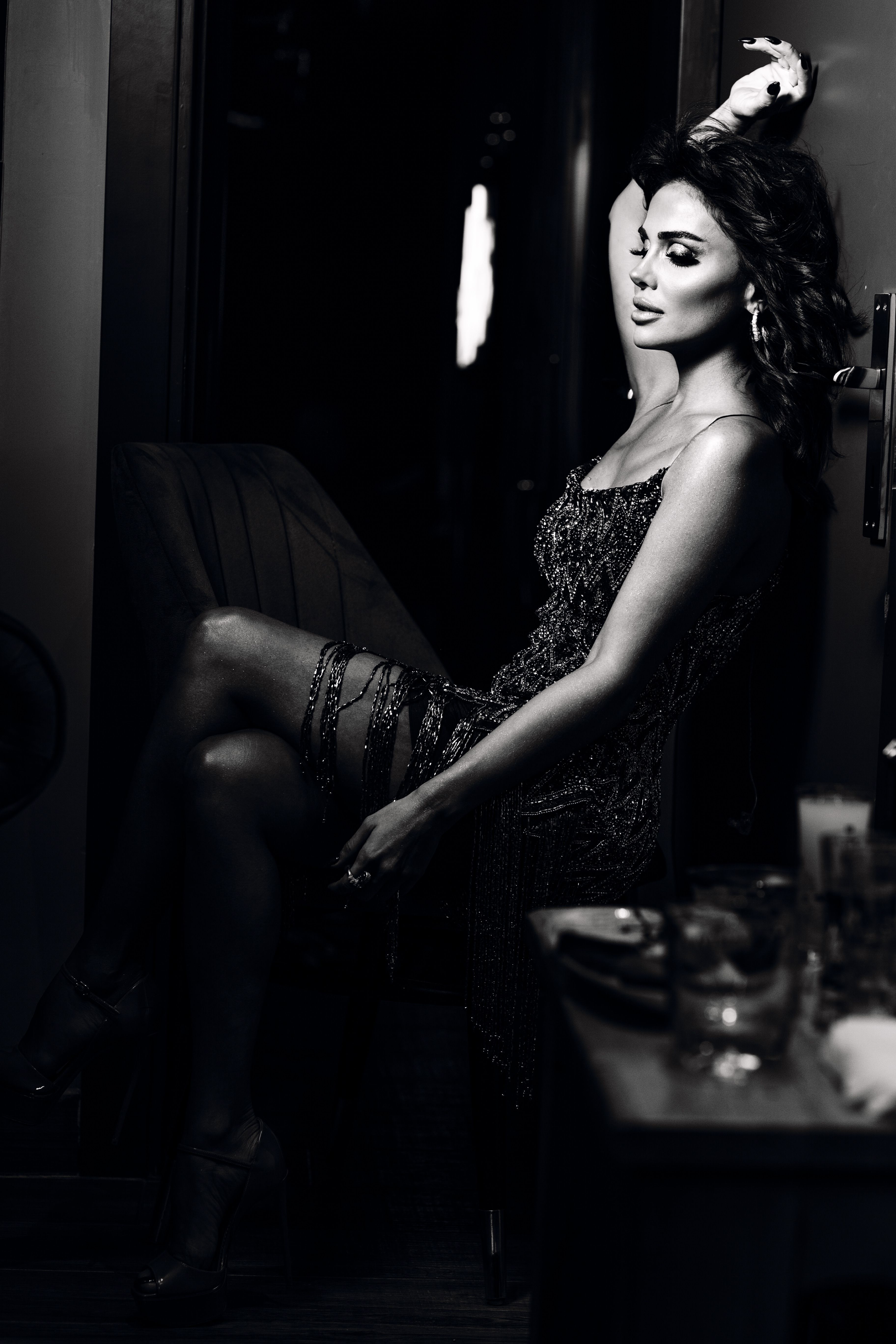Grayscale Photo of a Woman in a Stylish Dress · Free Stock Photo