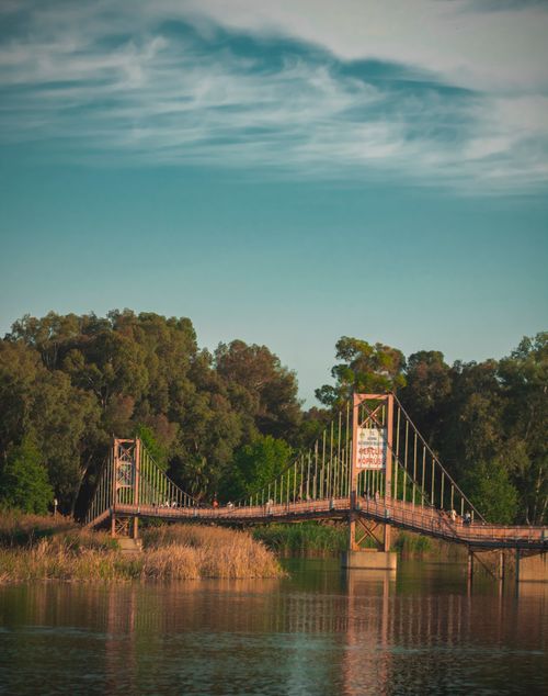 Free Explore a tranquil suspension bridge in Adana surrounded by nature and riverside beauty. Stock Photo