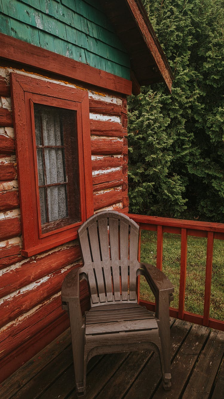 Plastic Chair On Cabin Porch