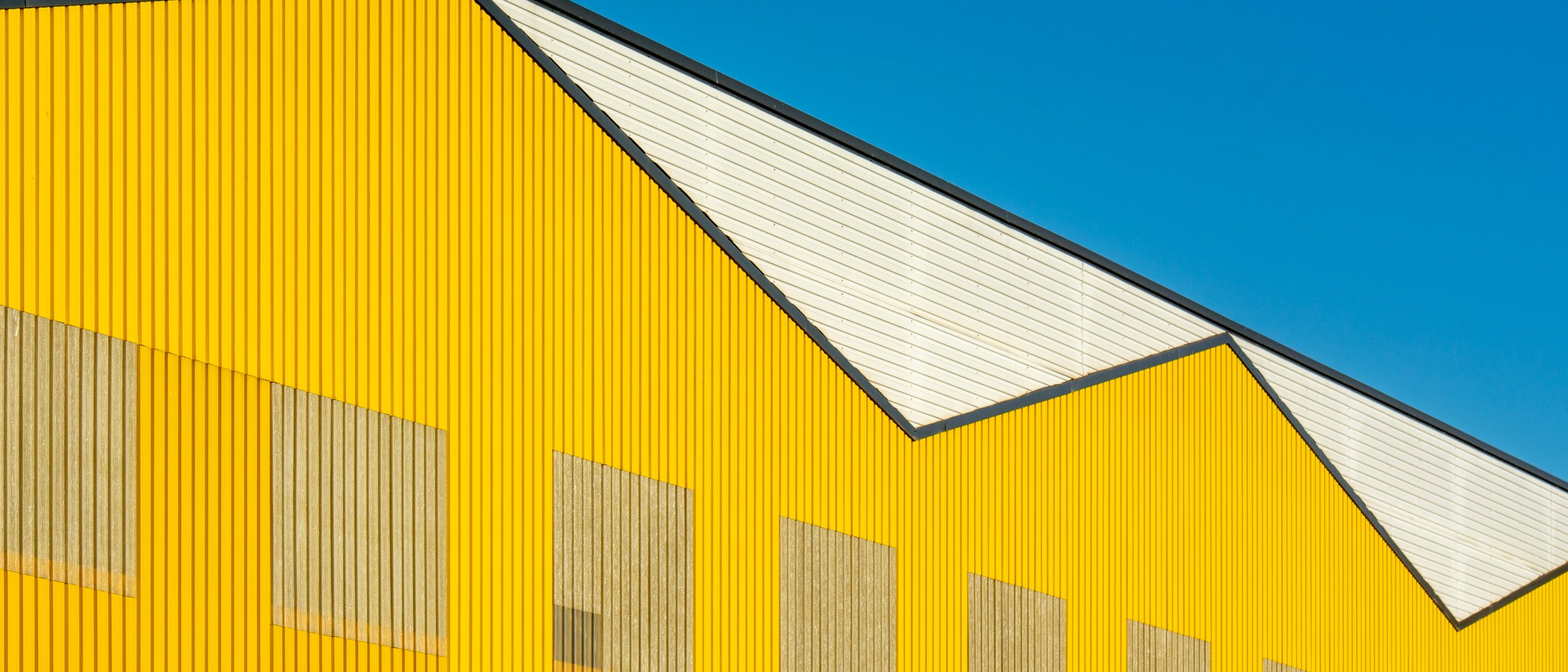 Exterior Painting in East Ham — a decorator at work mid-project