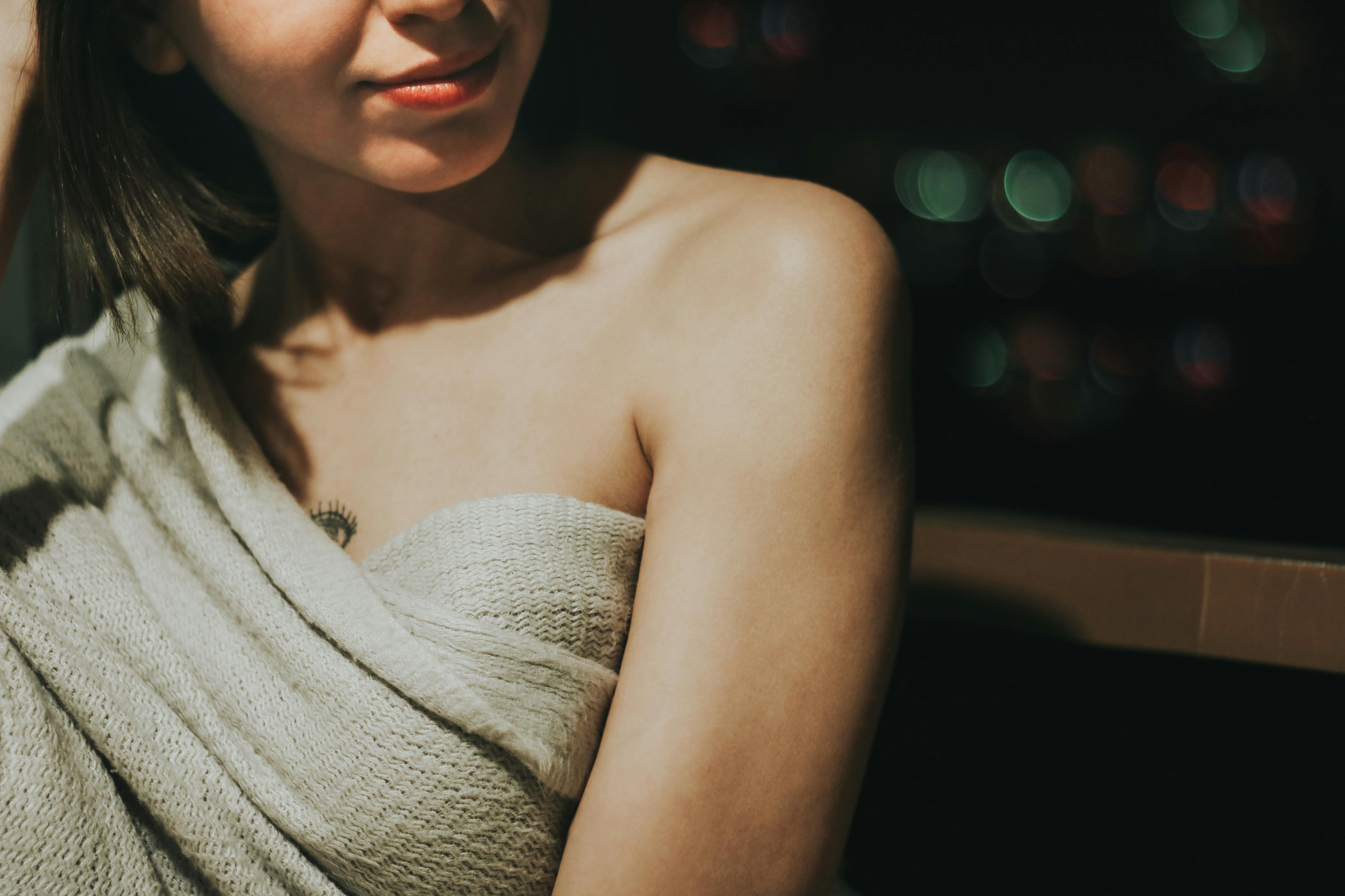 Close-up of Naked Woman in Cover in Dark · Free Stock Photo