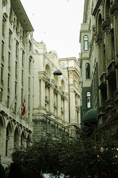 Explore the historic street with grand architectural facades in Istanbul, Türkiye.