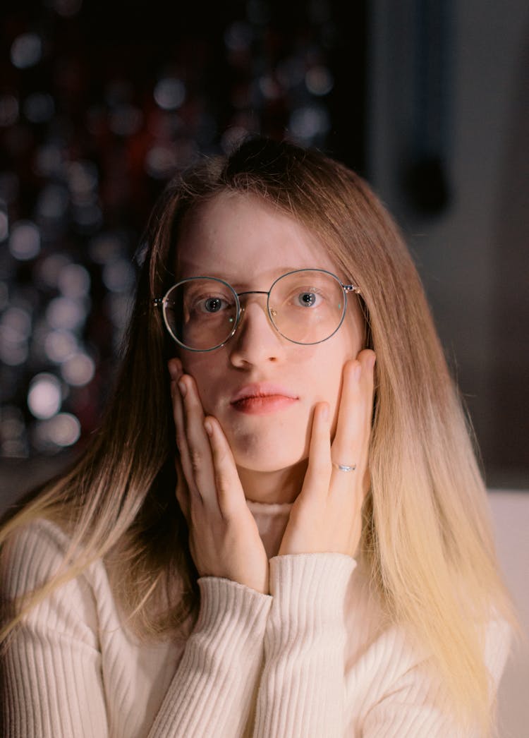 Portrait Of Young Woman In Glasses