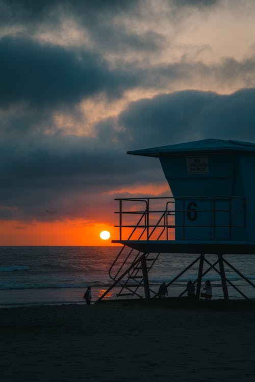 Lifeguard Post on Beach during Sunset