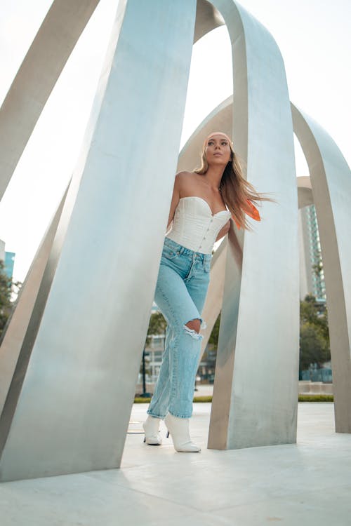 Woman Posing between Installation Beams