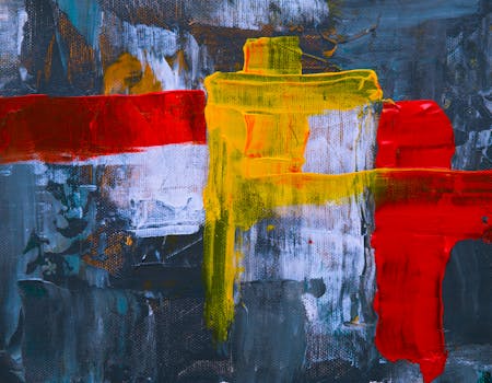 这幅充满活力的抽象画，画布上布满了大胆的红色、黄色和蓝色笔触