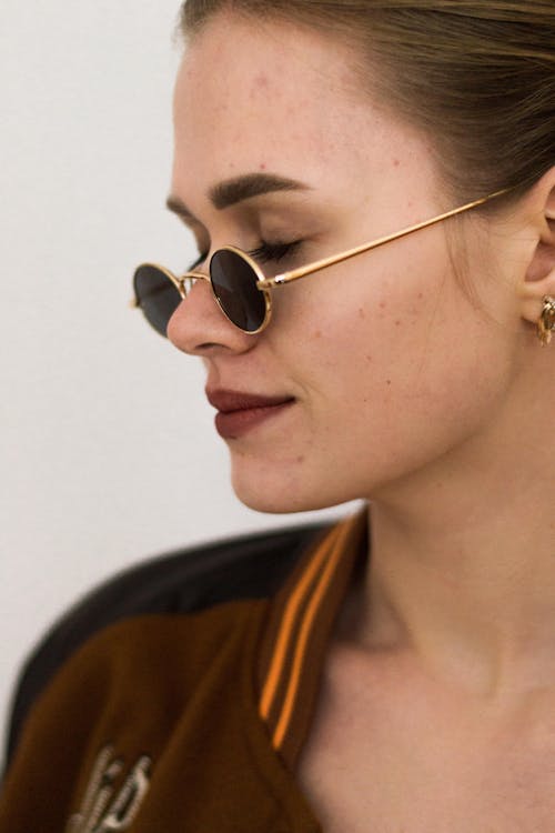 Portrait of a Young Woman in Sunglasses