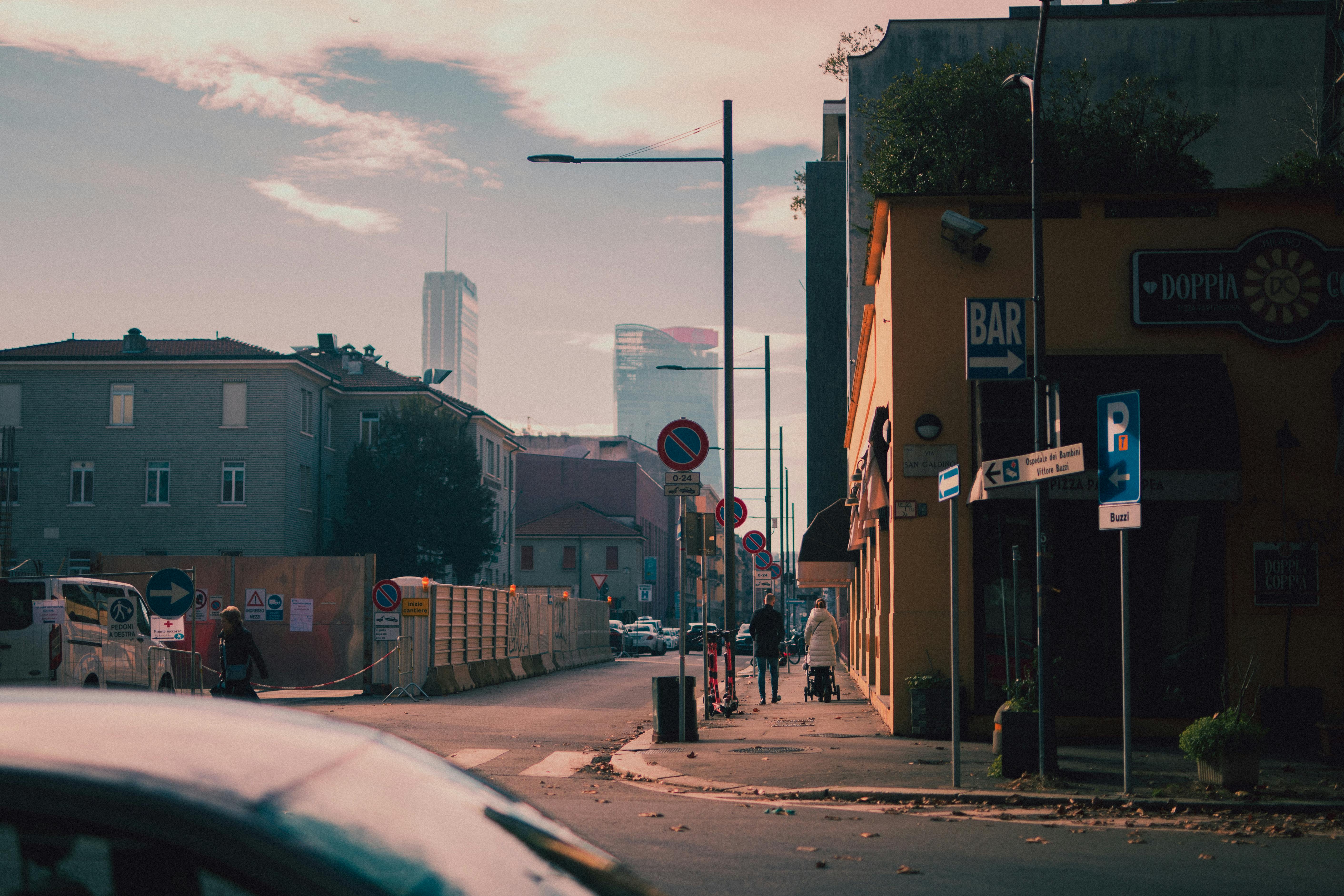 thriving DC neighborhood with modern buildings and pedestrians - investment property Washington DC