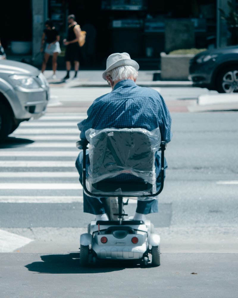 Rider using an electric mobility device outdoors