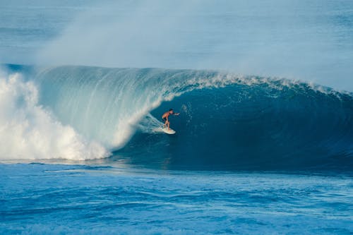 A Surfer Riding a Big Wave