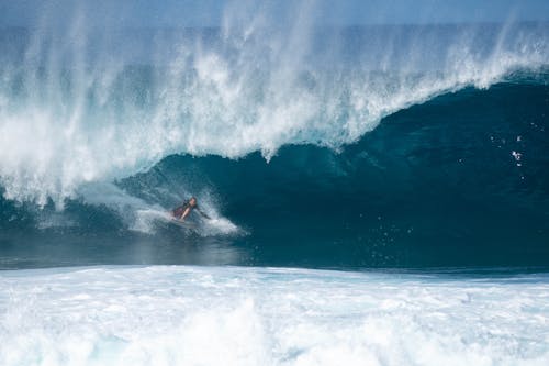 Person Surfing Sea Wave