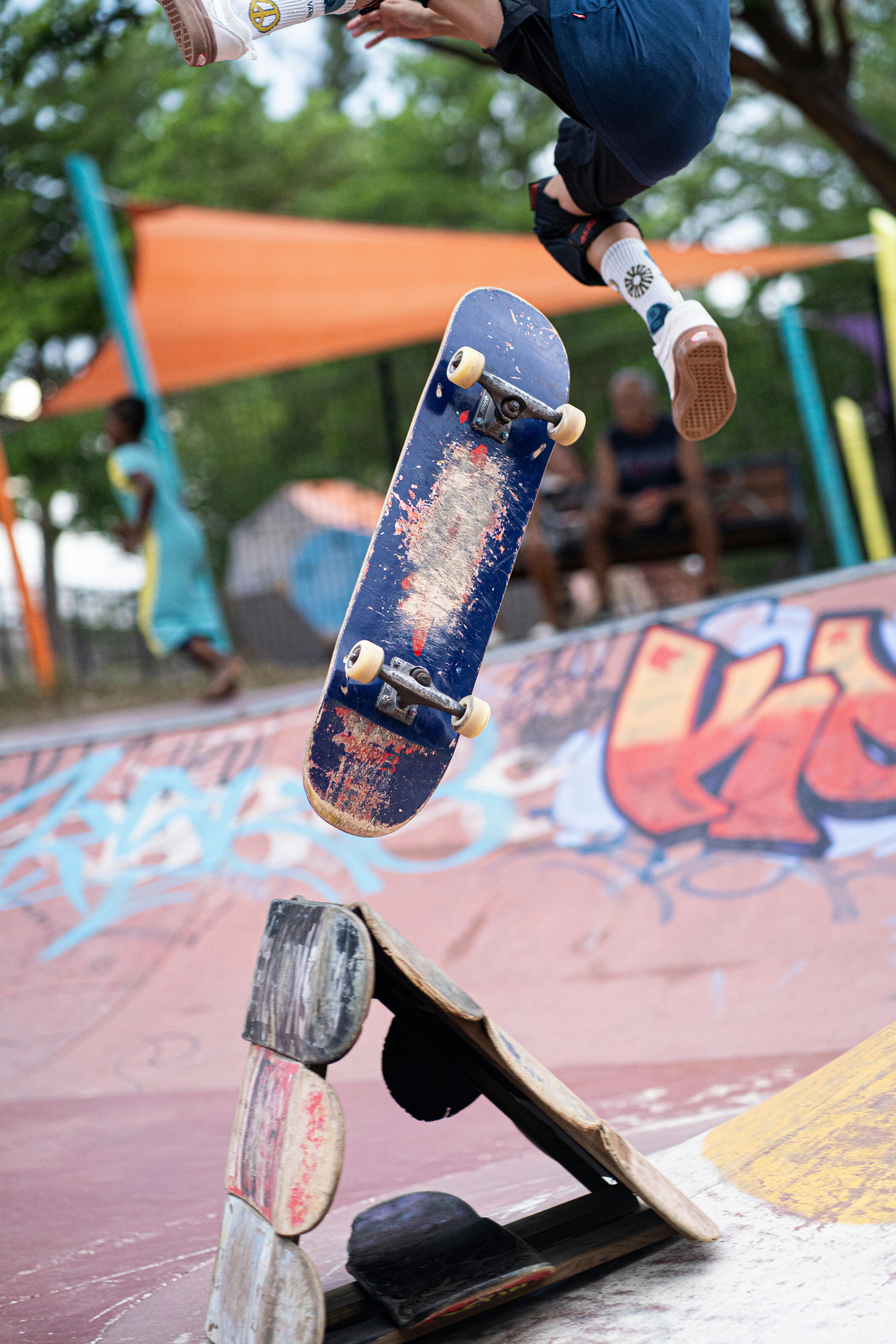 A Skateboarder Jumping from a Ramp · Free Stock Photo