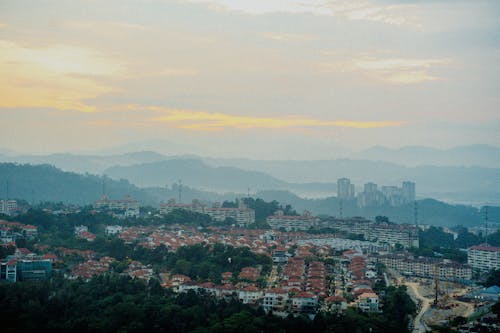 Clouds over City at Sunset