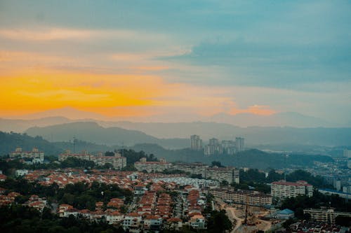 Clouds over City at Sunset