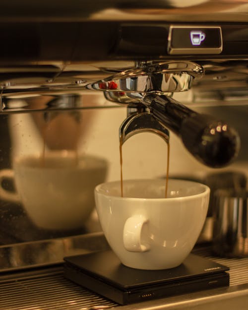 Coffee Machine Pouring Coffee to Cup