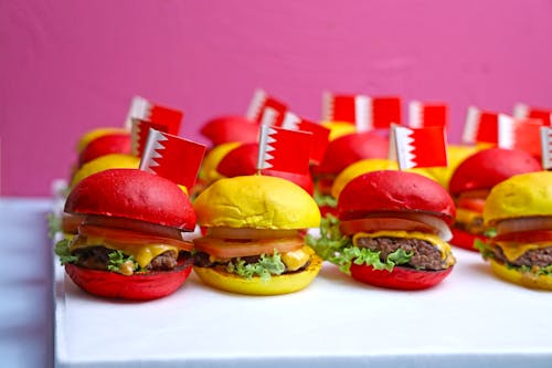 Free A row of hamburgers with flags on them Stock Photo