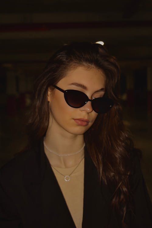 Close Up Photo of Woman Wearing Sunglasses