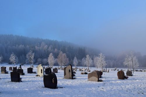 Free Snow-covered cemetery in Kongsvinger, Norge with frosty trees and gravestones. Stock Photo