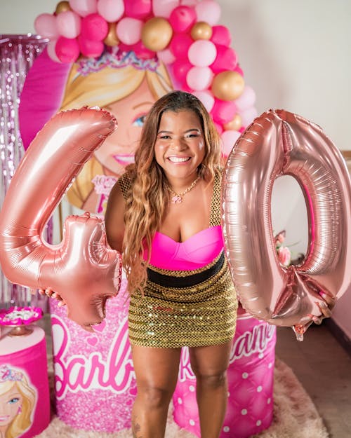 Woman Holding Pink Balloons