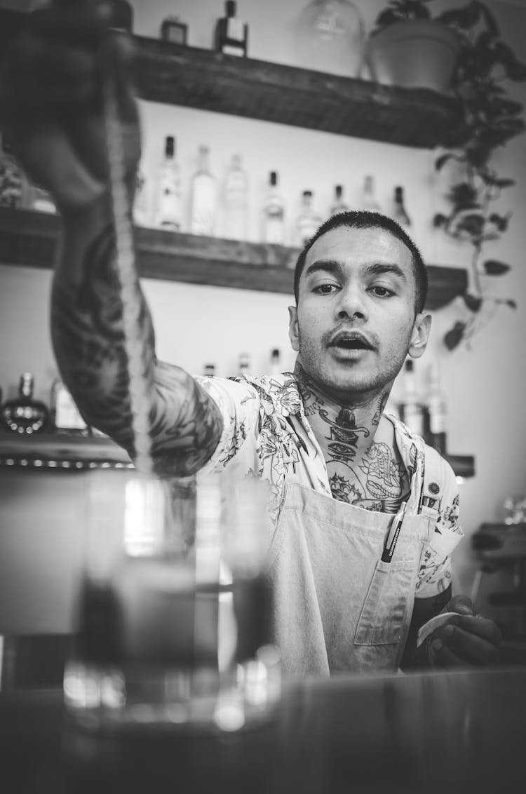 A Man Working In A Bar