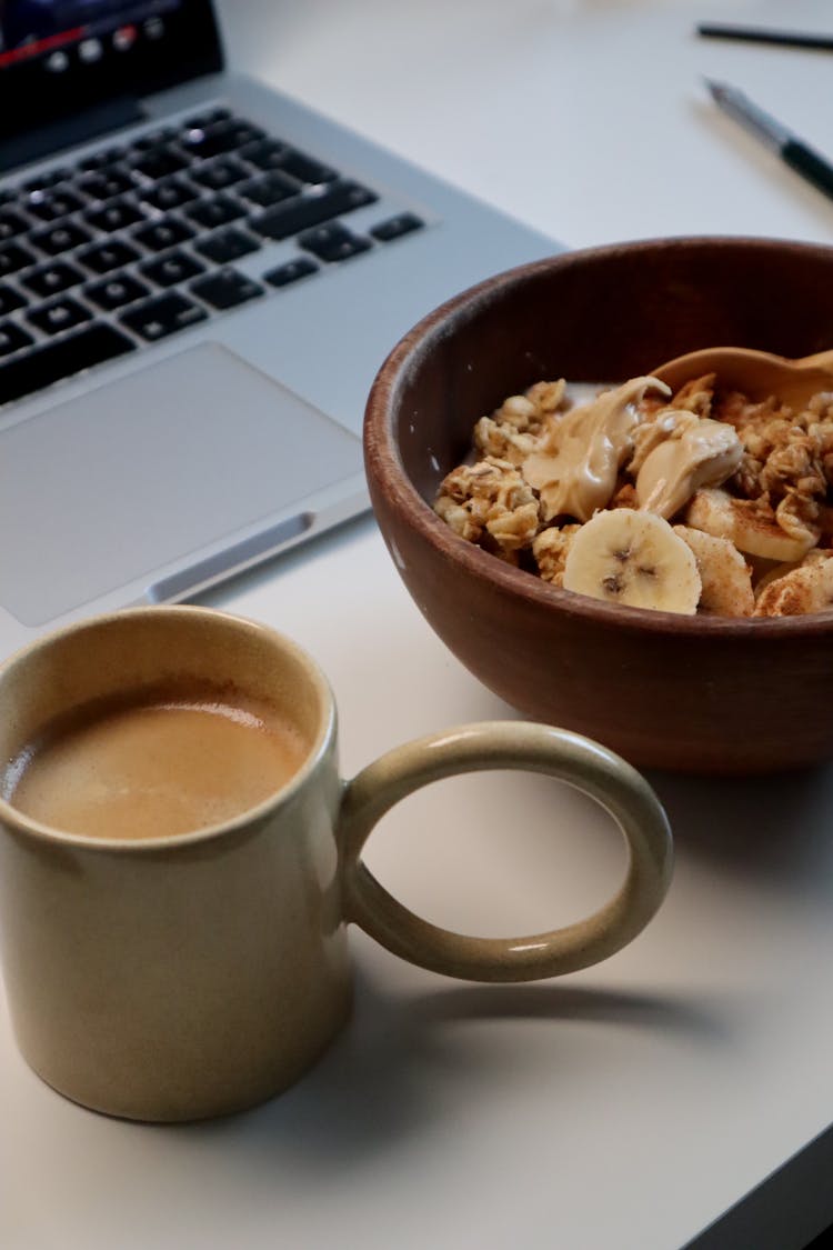 Banana And Cereal With Coffee For Breakfast