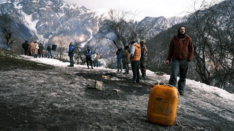 Group In Mountains In Winter