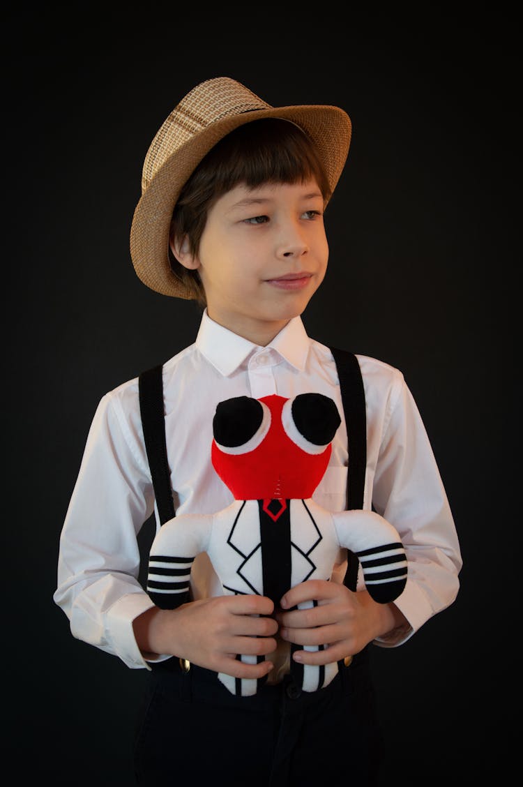 Boy Holding Toy