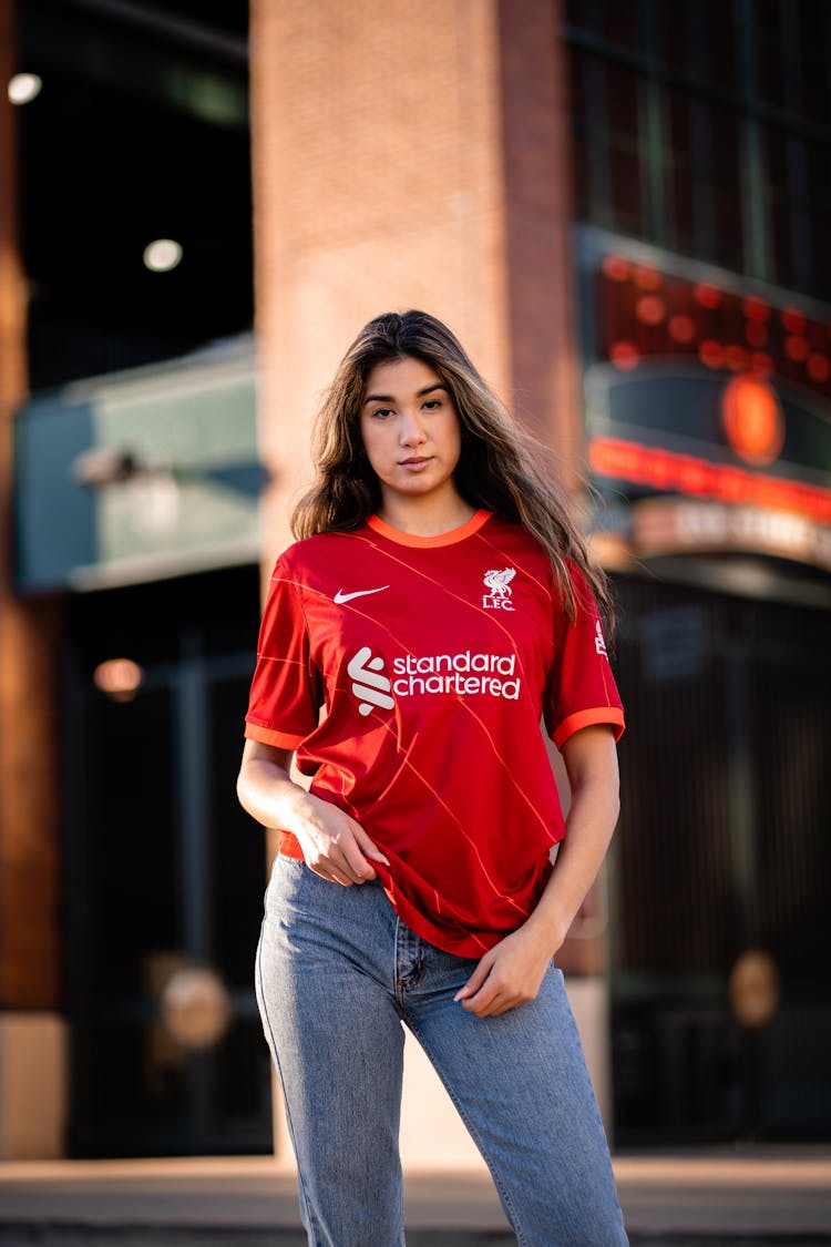 Young Woman In A Football Liverpool FC T-shirt