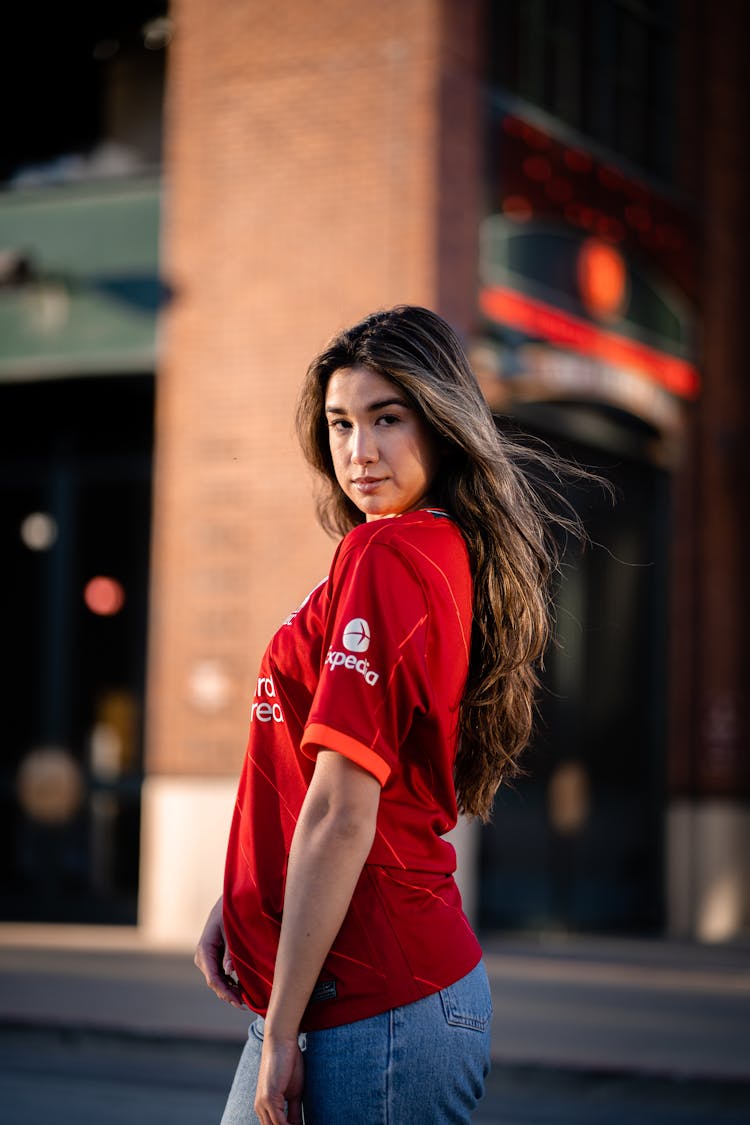 Young Woman In A Football Liverpool FC T-shirt