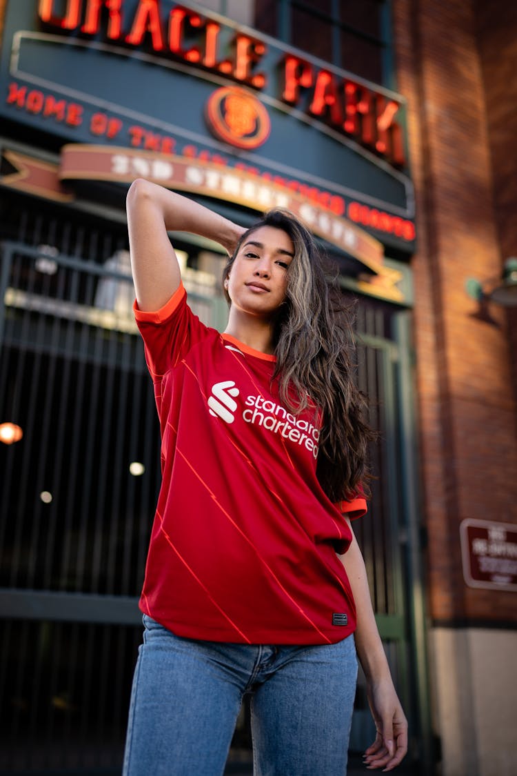 Young Woman In A Football Liverpool FC T-shirt