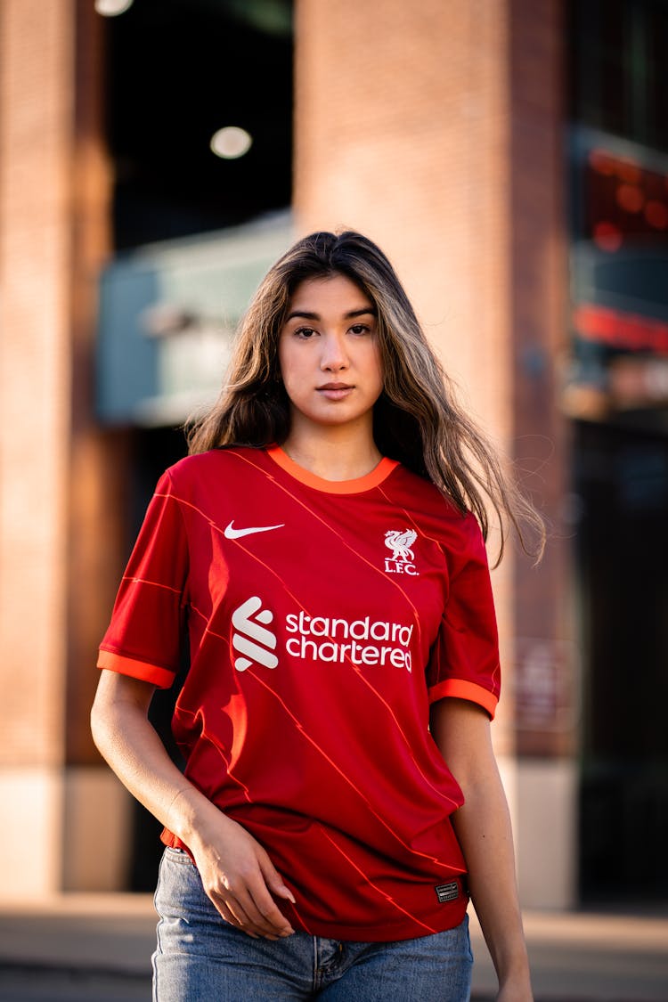 Young Woman In A Football Liverpool FC T-shirt