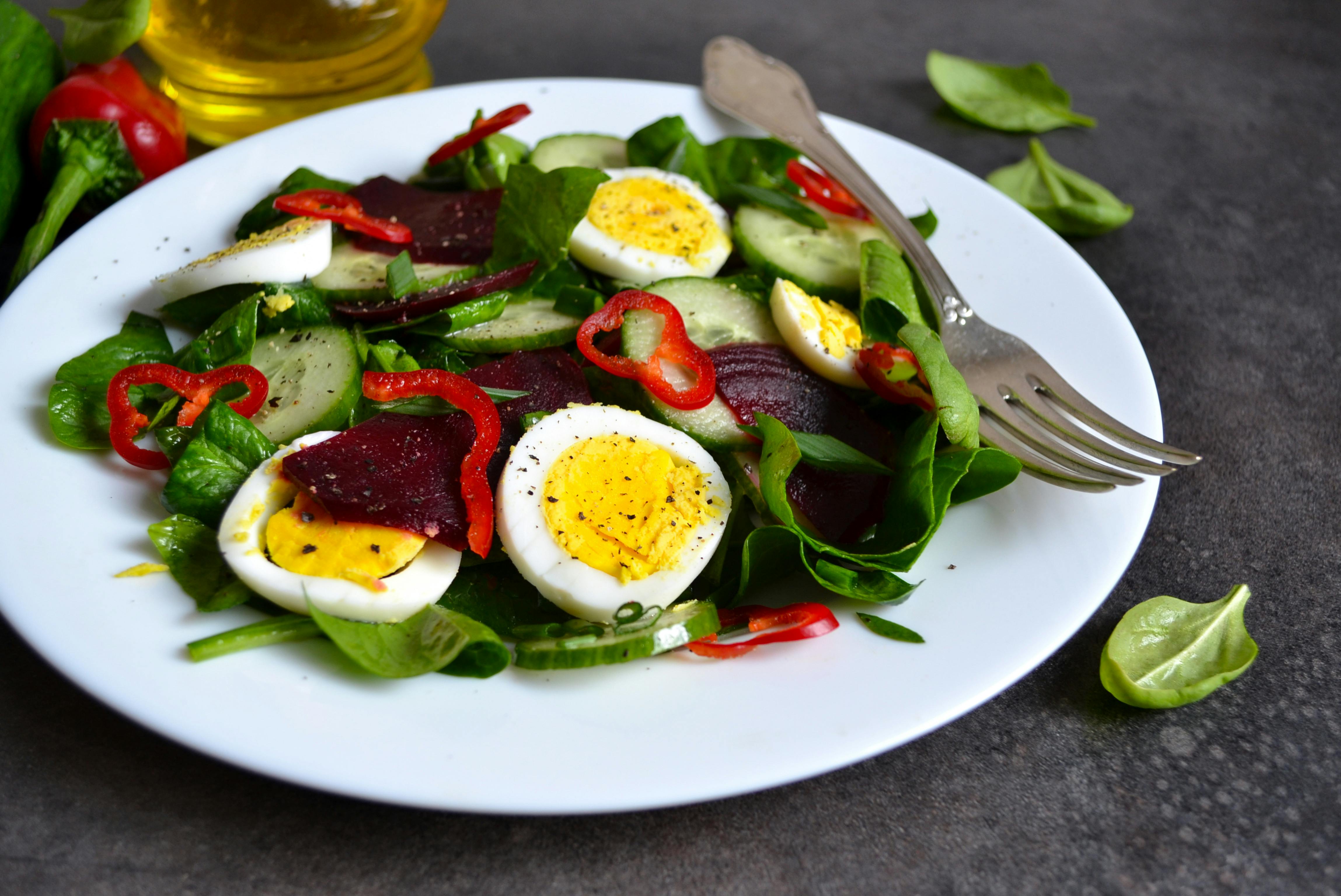 Hard Boiled Egg And Vegetables On Plate · Free Stock Photo