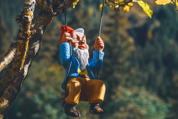 Gnome On Swing Chair