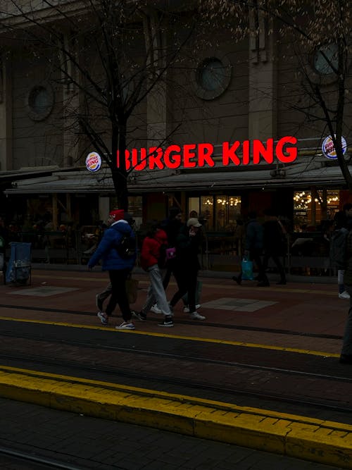 People Walking near Burger King