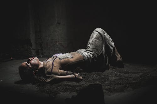 Woman Lying on the Ground
