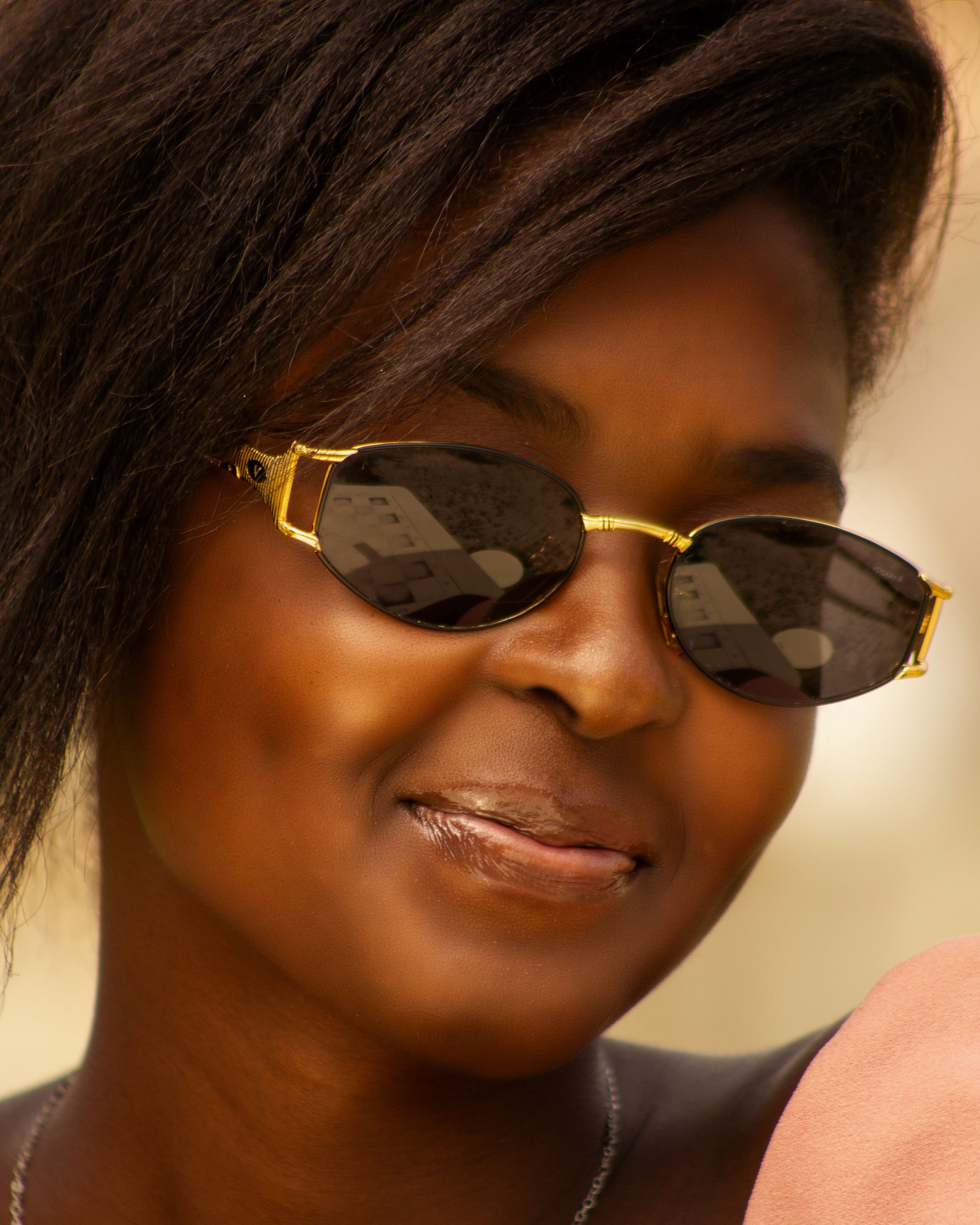 Close-Up Shot of a Woman Wearing Black Sunglasses · Free Stock Photo