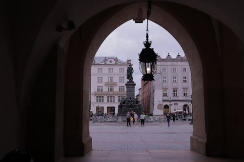 Hanging Lamp and Old Market Square in Krakow behind