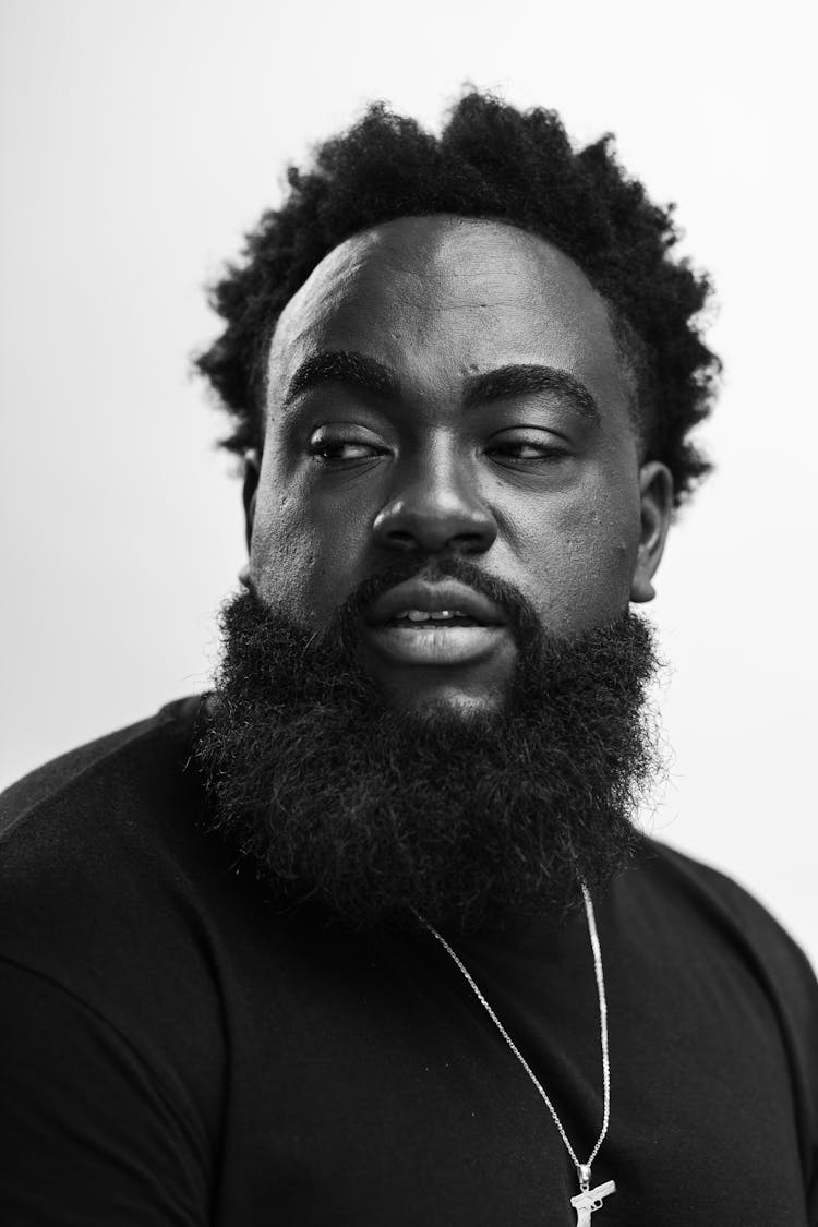 Face Of Man With Beard In Black And White