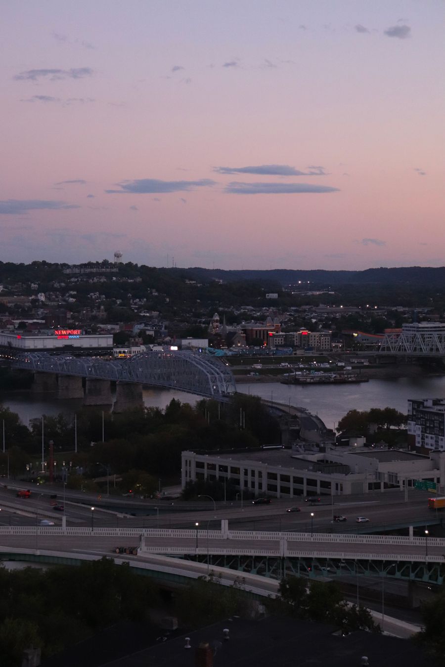 Cincinnati cityscape at sunset over the Ohio River