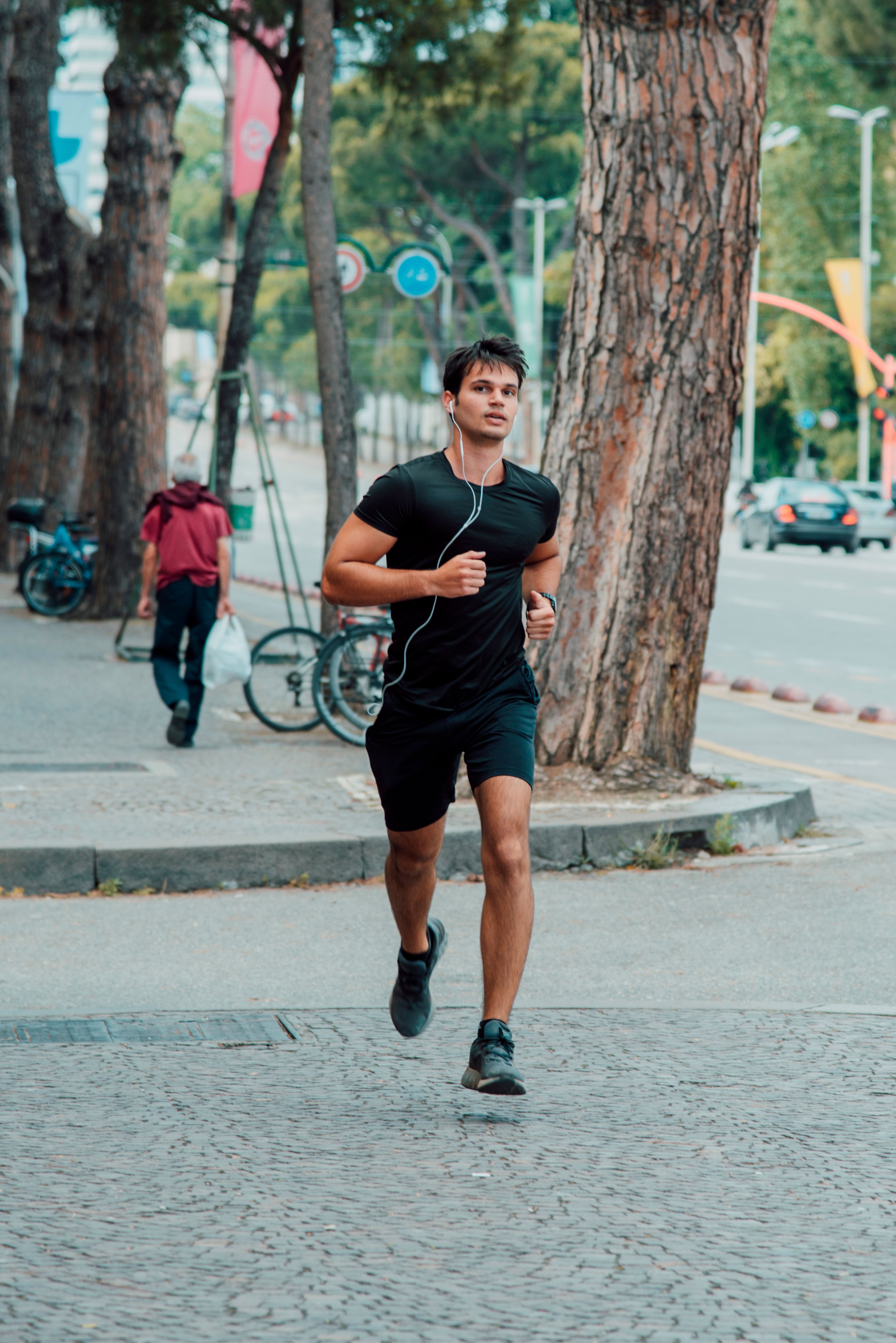 Runner using earphones during an urban workout