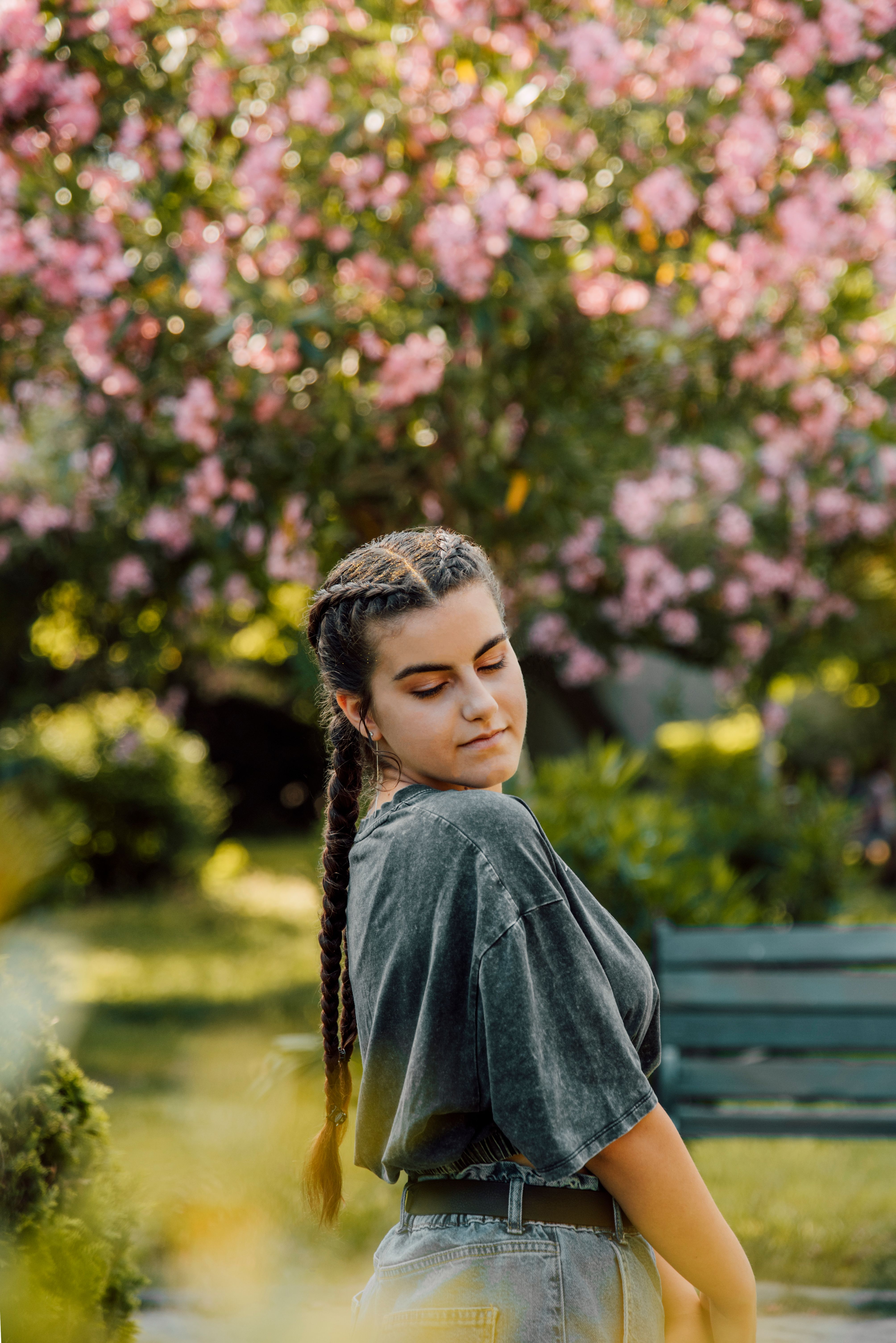 Girl Standing in a Park · Free Stock Photo