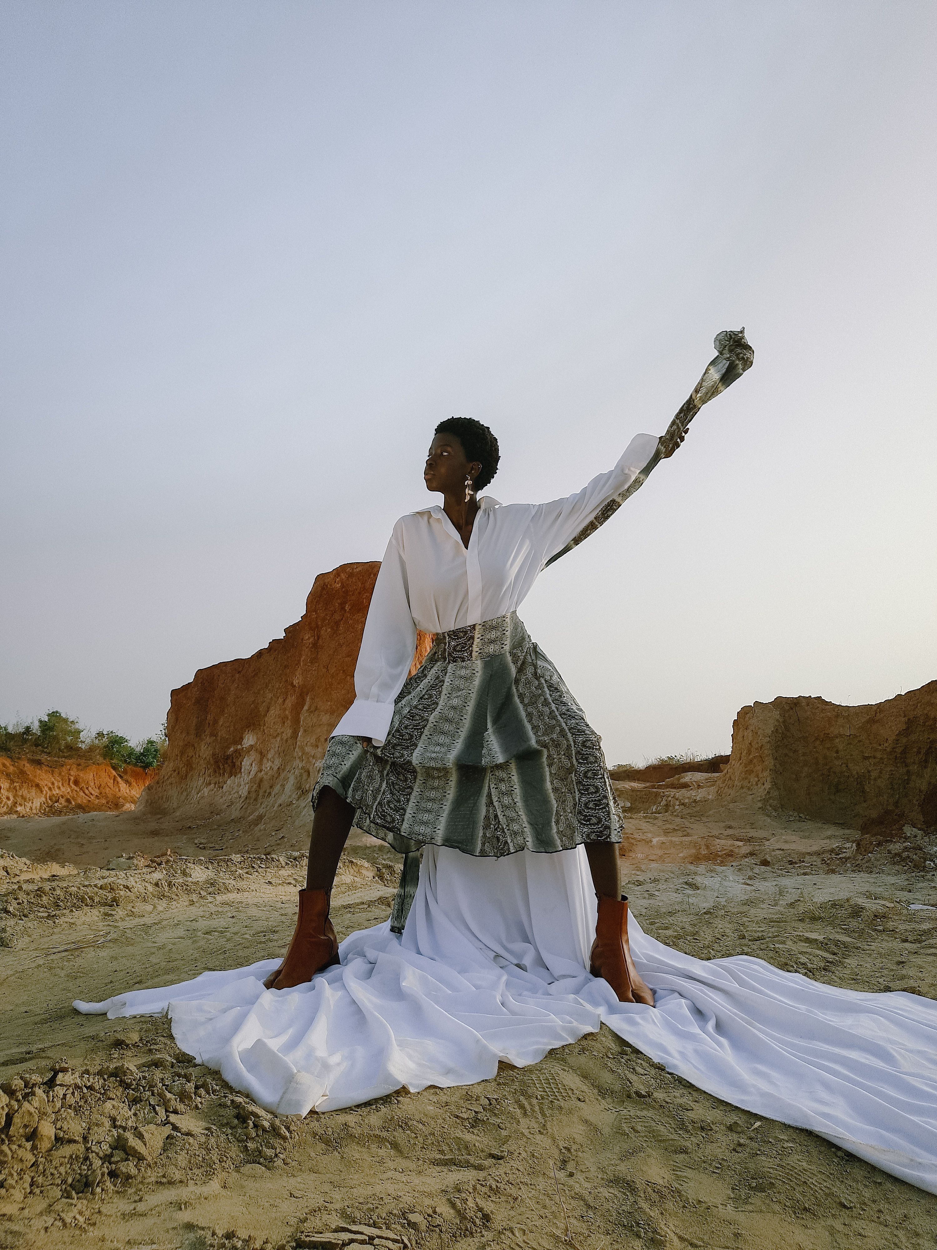 Woman Posing in Desert Landscape · Free Stock Photo