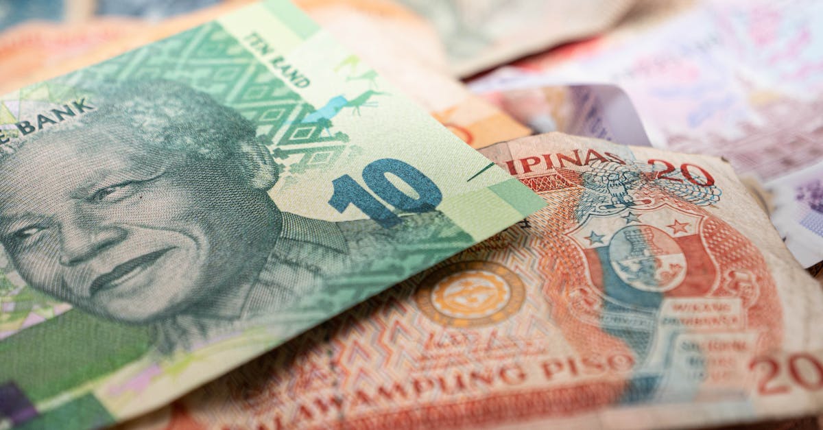 A detailed image featuring South African rand and Philippine pesos, highlighting cultural diversity in currency.