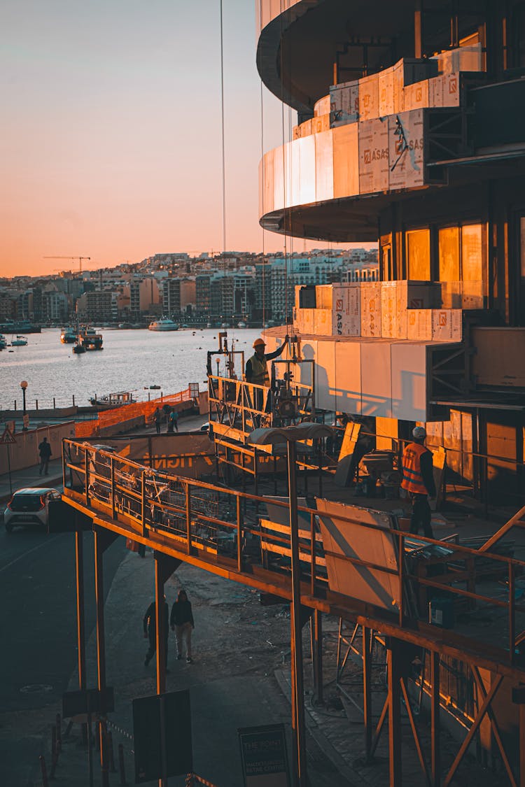 City Building Under Construction At Dusk 