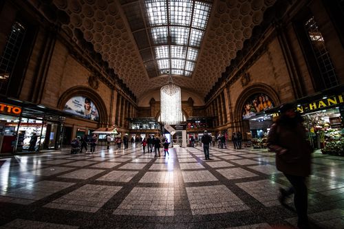 Free Wide-angle view of Leipzig Hauptbahnhof showcasing its stunning architecture and bustling atmosphere. Stock Photo