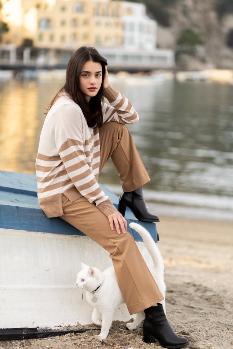 Woman Sitting On The Boat