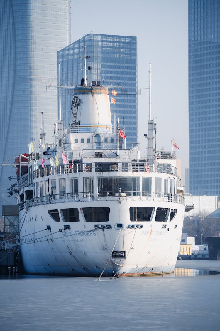 A Large Ship In A Harbor In City 