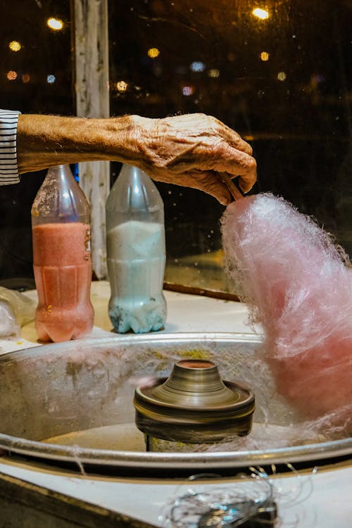 A Person Making Cotton Candy