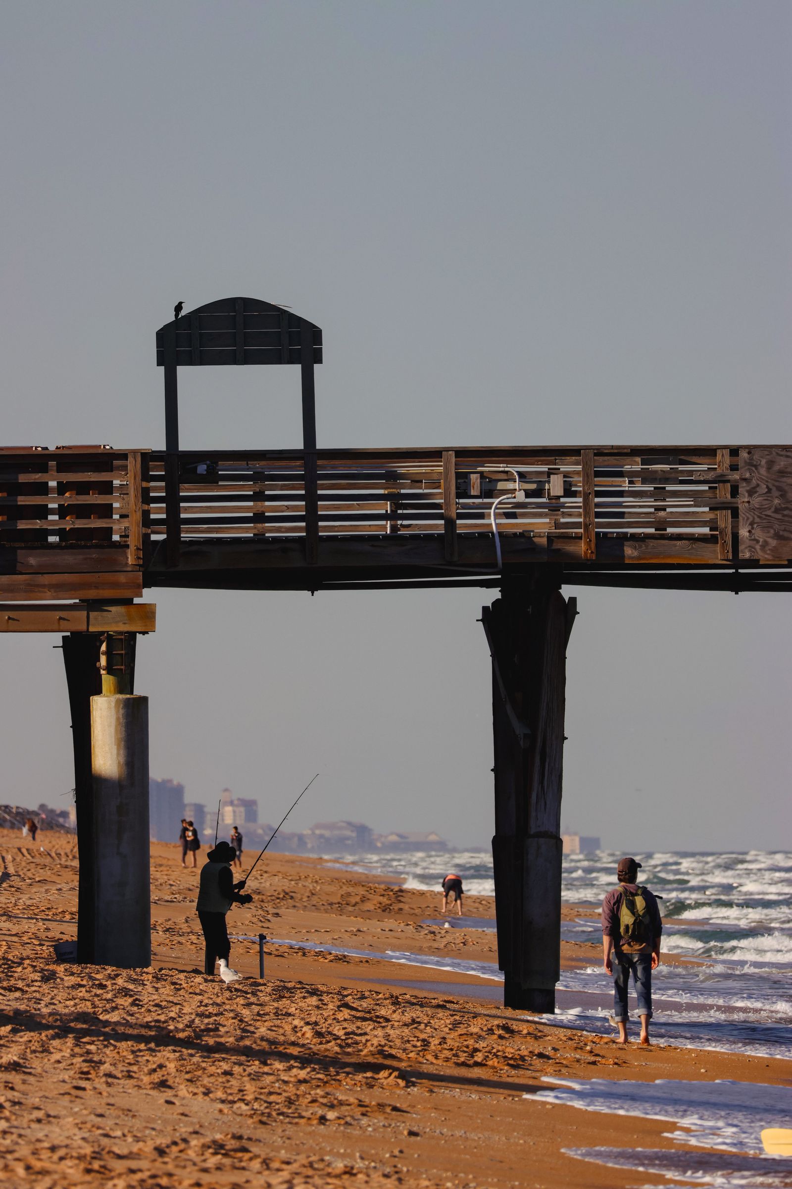 People on the beach fishing at Flagler Beach, Florida